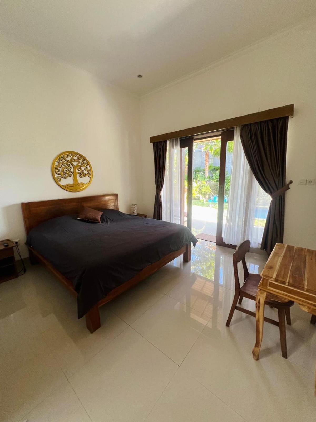 Wiryaroja Guest House Canggu Kültér fotó